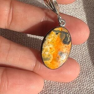 Elegant Orange and Silver Pendant